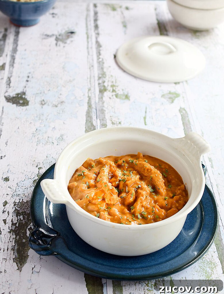 Oil-Free Vegan Butter Chicken with Soy Curls: Creamy Plant-Based Recipe 4 Vegan butter chicken made with soy curls in a white casserole dish