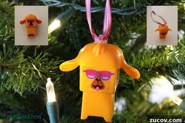 Christmas Survival Hacks for Busy Moms: 9 Time-Saving Tips 3 An orange block toy turned into a Christmas ornament with a Christmas Hack of using ribbon and hot glue