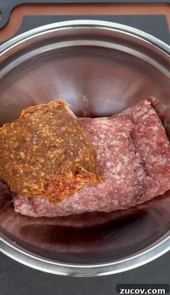 Crispy Griddle Breakfast Sandwich Recipe for Busy Mornings 5 ground pork and chorizo in a bowl