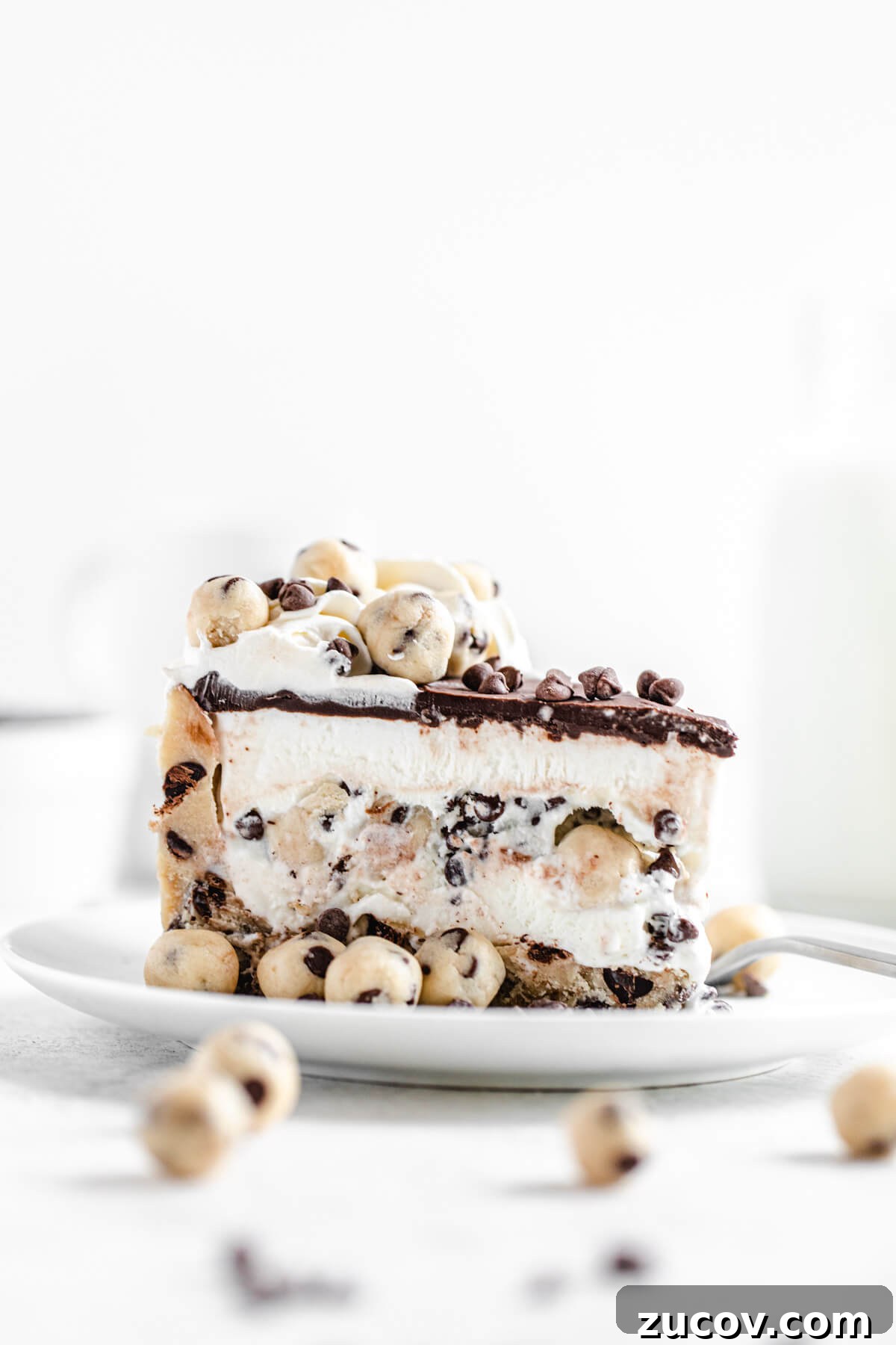Chocolate Chip Cookie Dough Ice Cream Cake Recipe for Summer Parties 3 slice of ice cream cake on a white plate