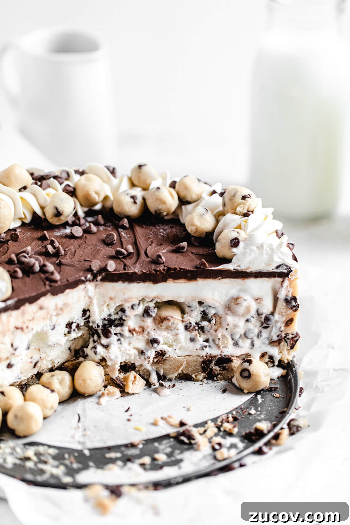 Chocolate Chip Cookie Dough Ice Cream Cake Recipe for Summer Parties 4 sliced ice cream cake on a platter