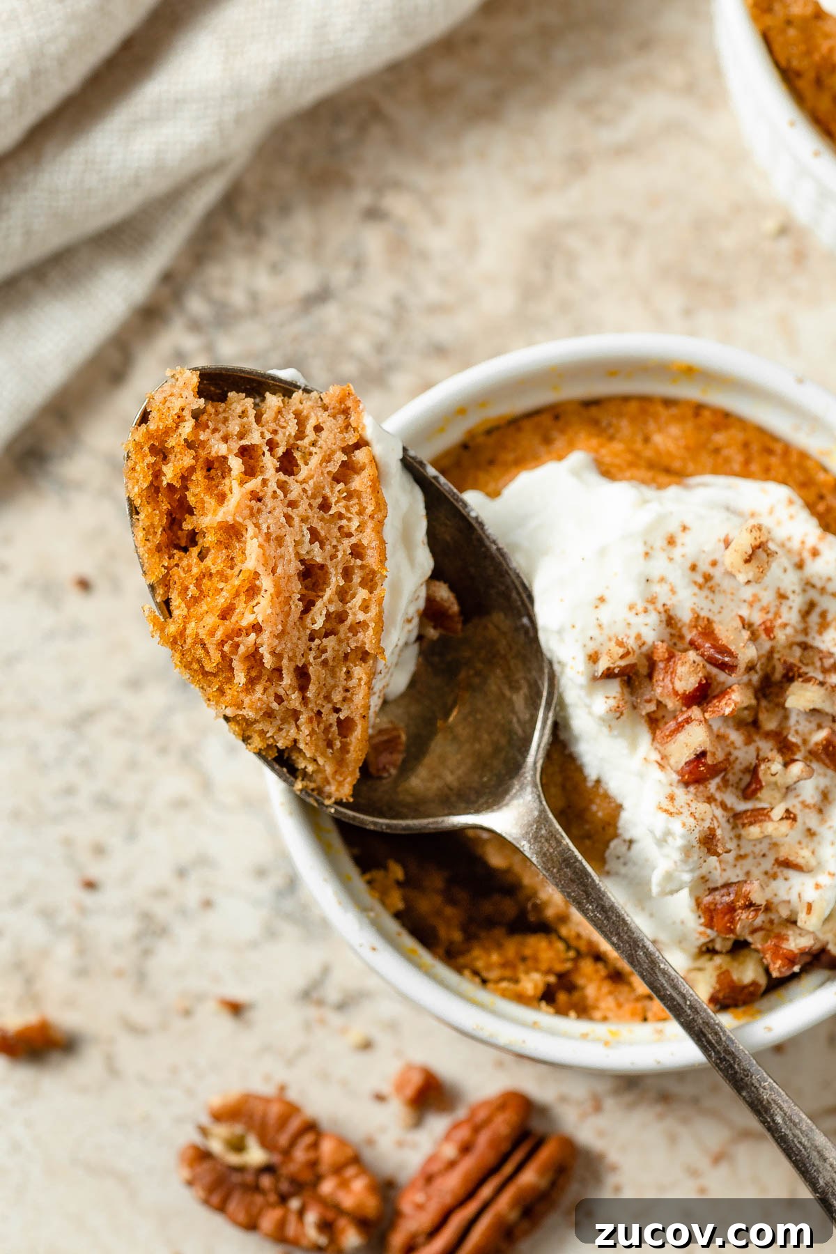 Keto Pumpkin Mug Cake Recipe: Quick Low-Carb Dessert 3 Keto pumpkin mug cake in a spoon