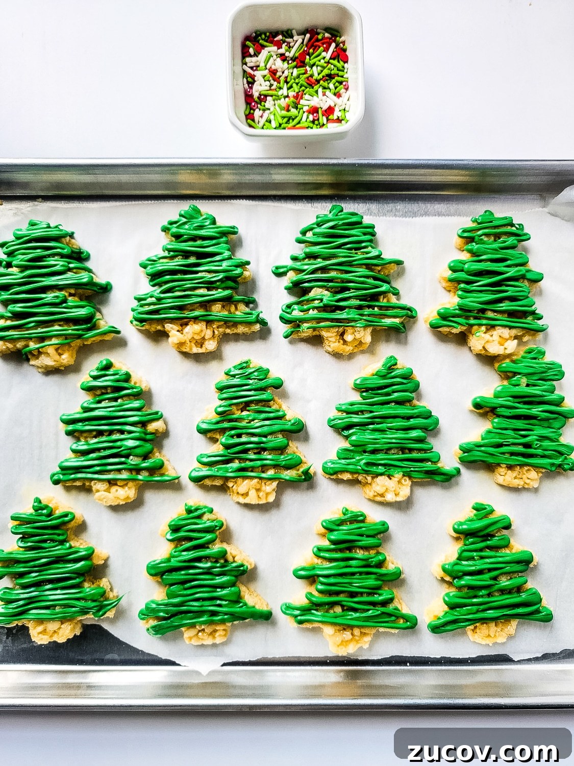 Rice Krispie Christmas Tree Treats: Festive Holiday Snack Craft 9 christmas tree shaped Rice Krispies with icing