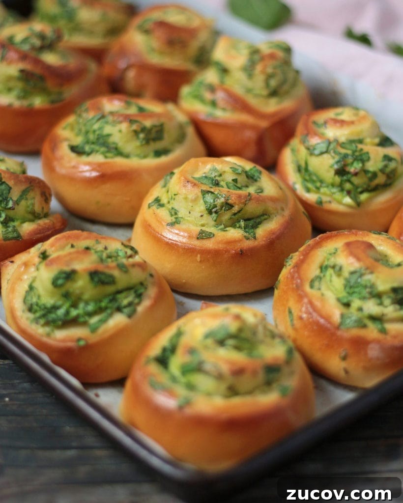 Savory Spinach & Ricotta Stuffed Roll Recipe 4 Spinach and Ricotta Rolls on the Baking Tray