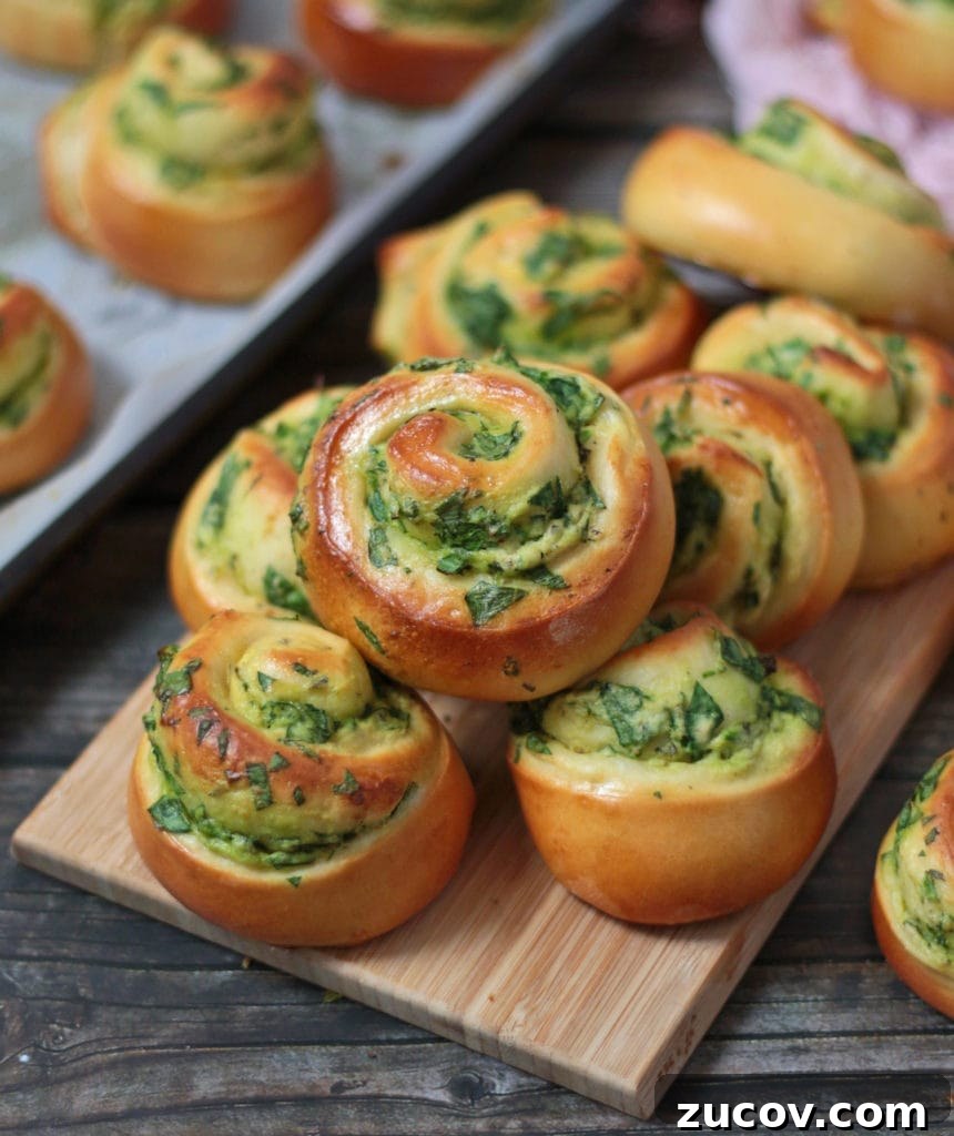 Savory Spinach & Ricotta Stuffed Roll Recipe 7 Spinach and Ricotta Rolls on a serving board