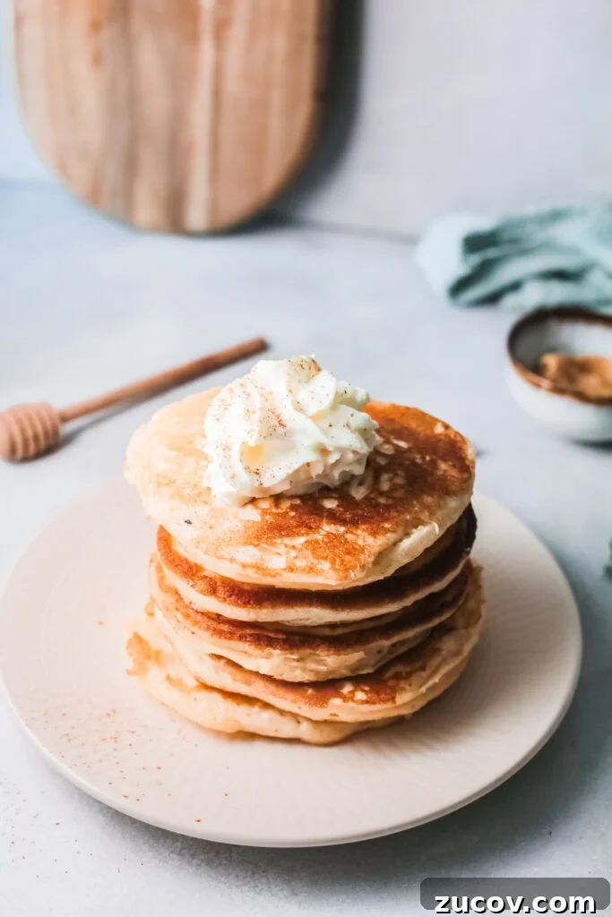 Eggnog Pancakes Recipe for Fluffy Holiday Breakfast 4 Eggnog Pancakes with syrup