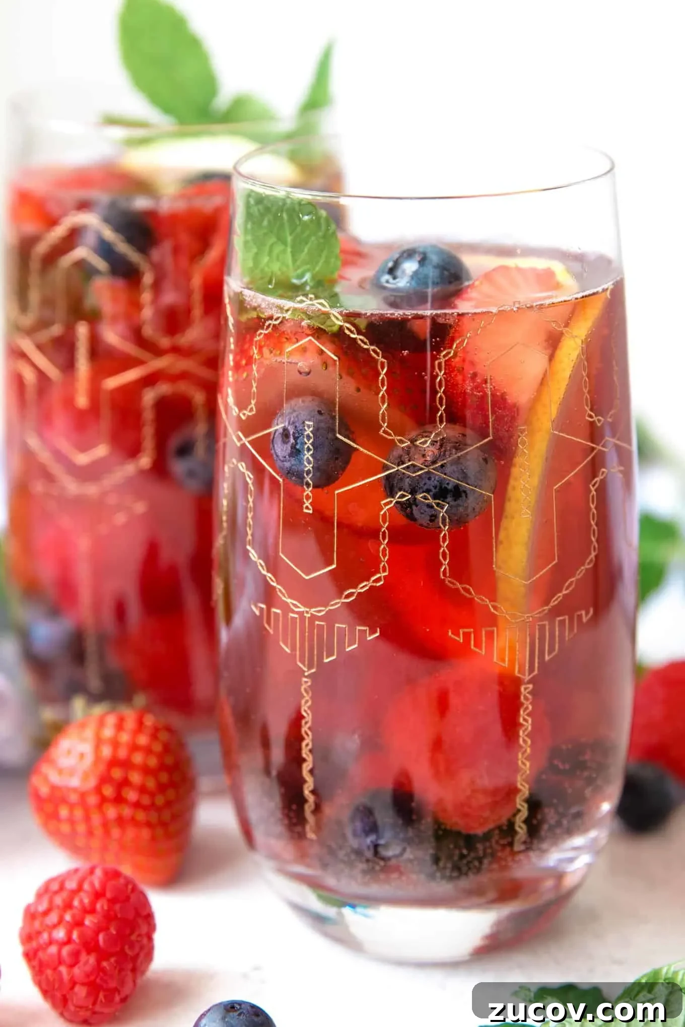 Berry Rosé Sangria Recipe for Summer Parties 10 two glasses of berry rosé sangria