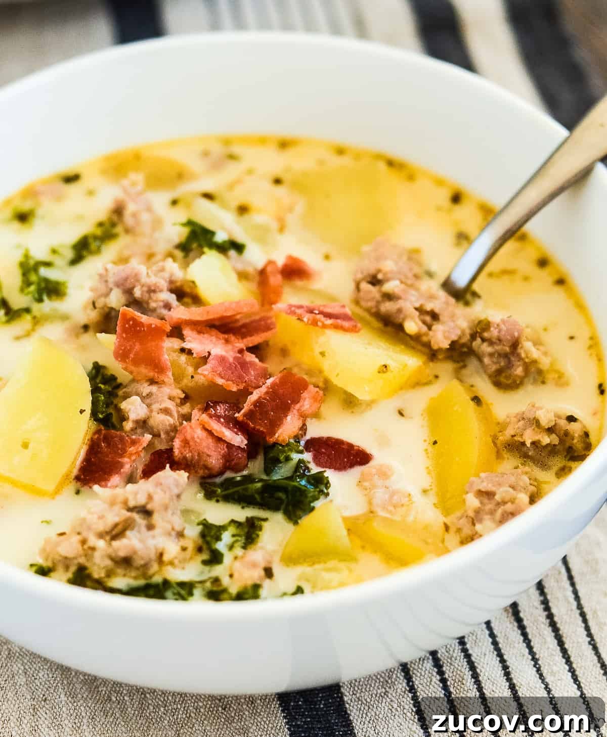 One-Pot Zuppa Toscana Recipe: Authentic Italian Sausage Soup 5 bowl of one pot zuppa toscana soup with bacon bits