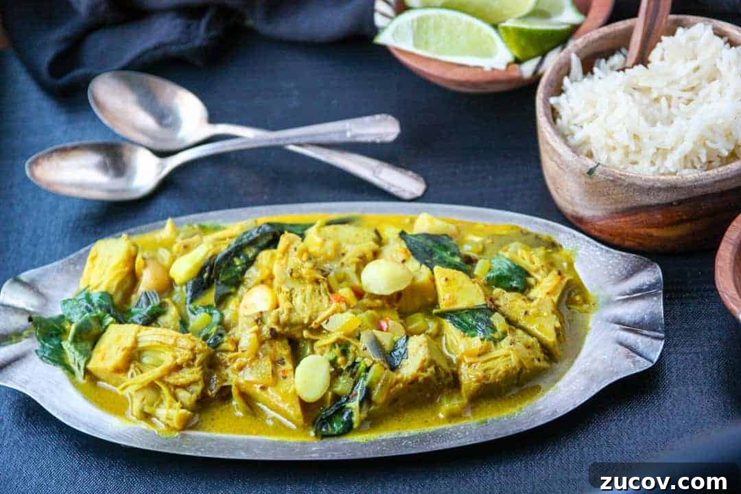 A plate of food on a table, with a dish of rice