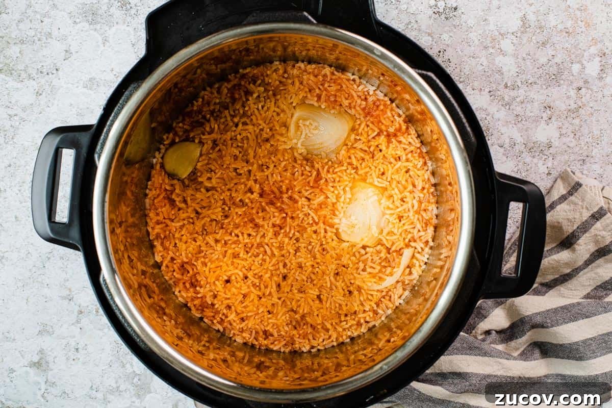 Instant Pot Arroz Rojo (Mexican Red Rice) 9 mexican rice in the instant pot right after it's been cooked