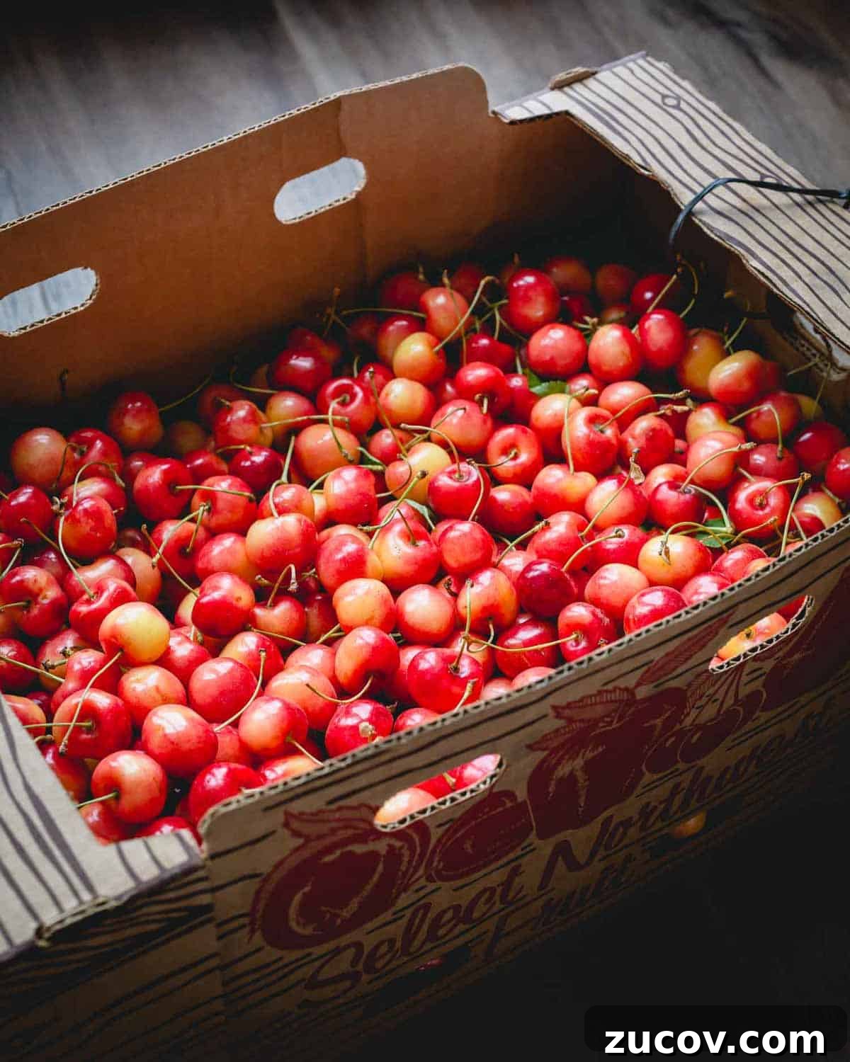 Cherry Guide: Varieties, Growing Tips, and Harvesting Advice 2 A box of rainier cherries.