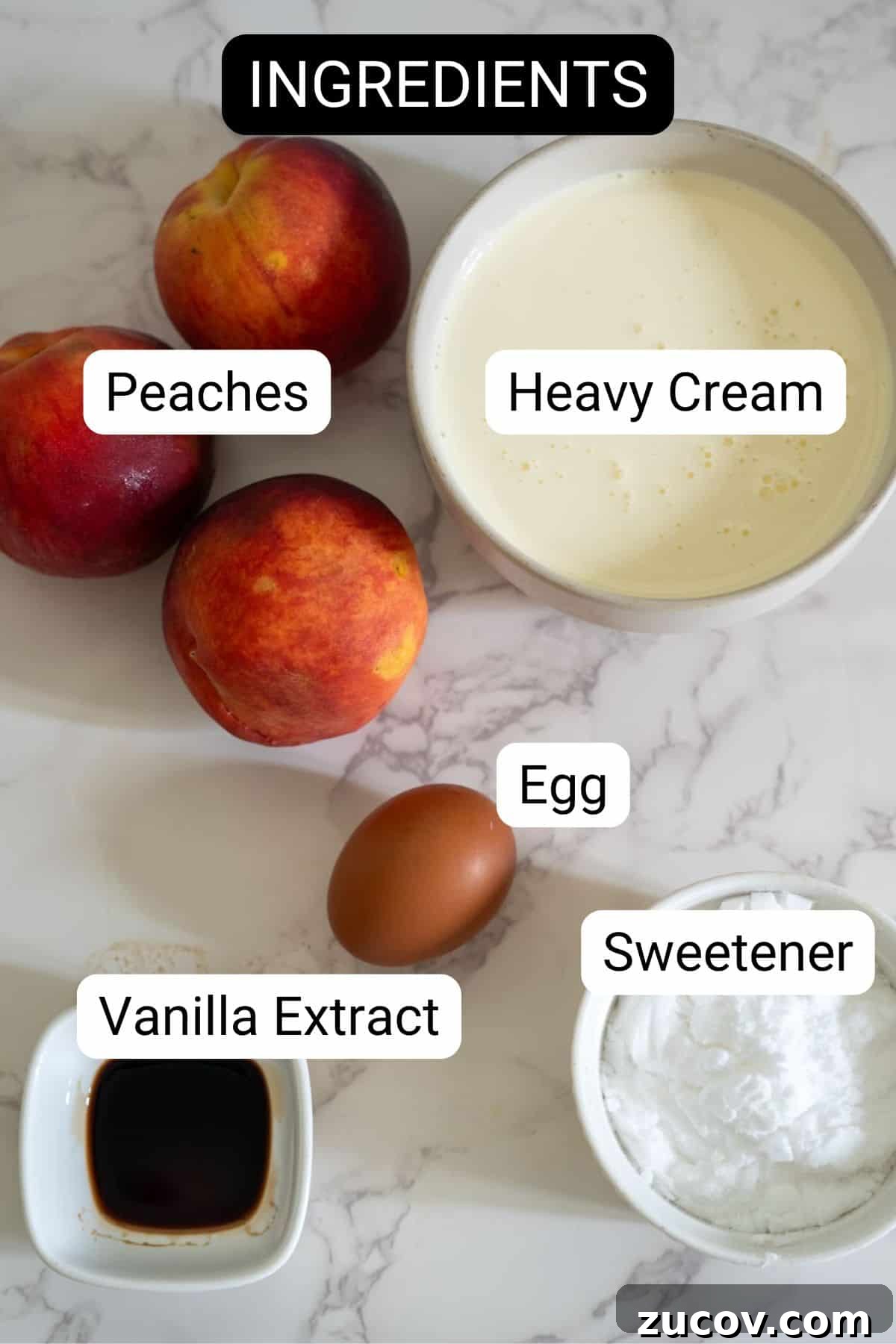 Keto Peach Ice Cream Recipe: Creamy Low-Carb Frozen Dessert 3 Ingredients include peaches, heavy cream, an egg, vanilla extract, and sweetener, all arranged on a marble surface.