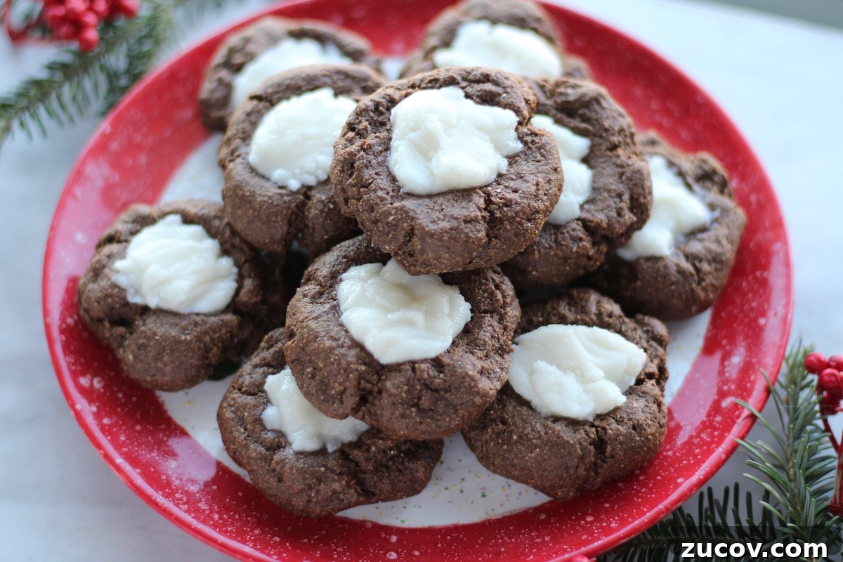 AIP Chocolate Mint Thumbprint Cookies (Paleo-Friendly) 3 AIP Chocolate Mint Thumbprint Cookies (Paleo) - thick, chewy carob cookies taste just like chocolate and are filled with a creamy peppermint frosting! Yum! | fedandfulfilled.com
