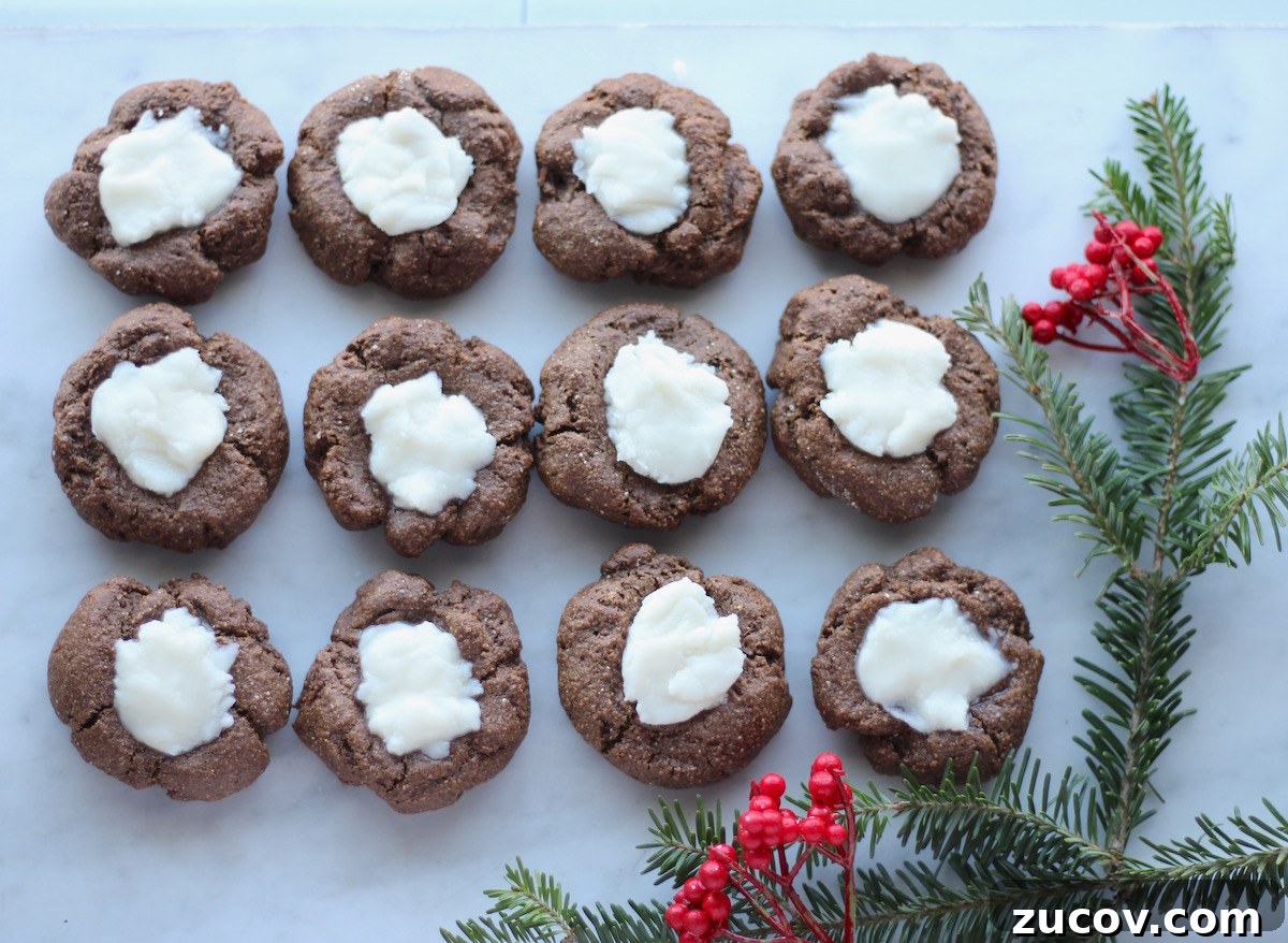 AIP Chocolate Mint Thumbprint Cookies (Paleo) - soft, thick carob cookies tastes just like chocolate and are filled with creamy peppermint frosting! | fedandfulfilled.com