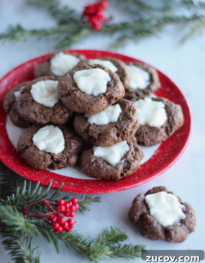 AIP Chocolate Mint Thumbprint Cookies (Paleo) - thick, chewy carob cookies taste just like chocolate and are filled with a creamy peppermint frosting! Yum! | fedandfulfilled.com