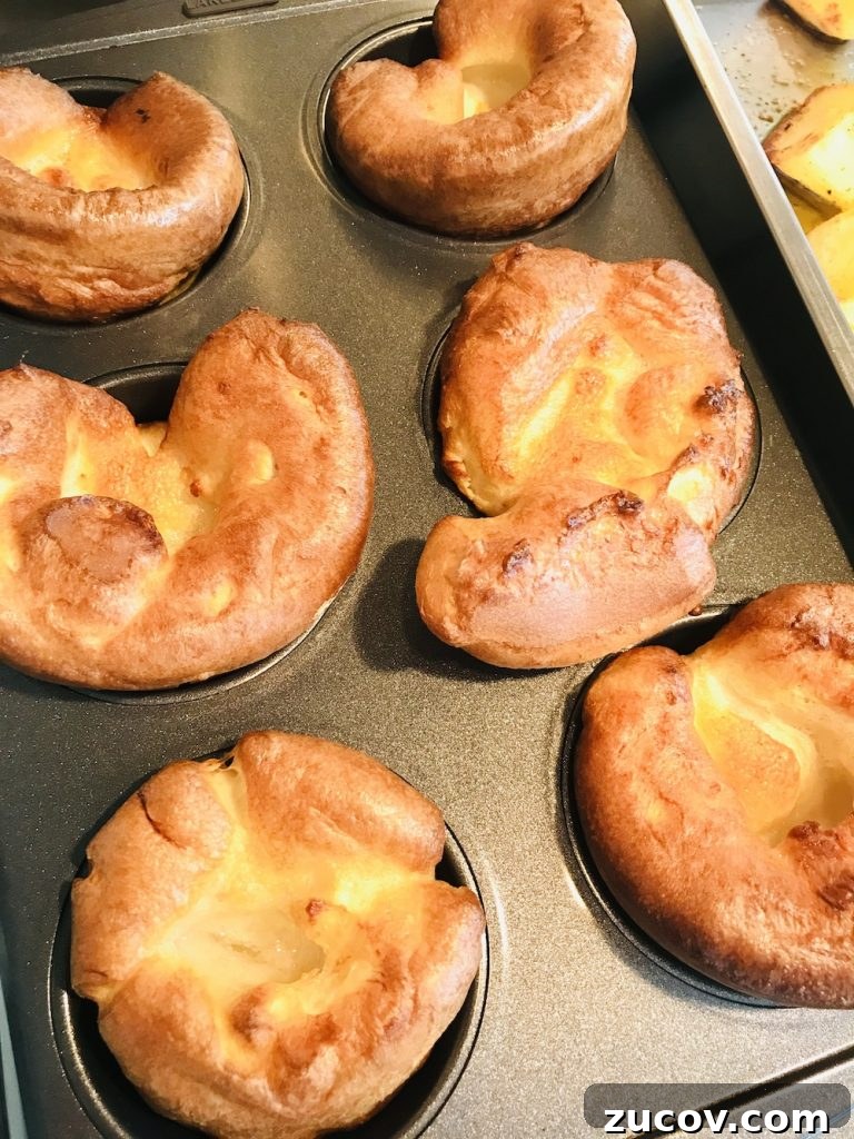 Classic Yorkshire Pudding Recipe: Crispy, Fluffy & Authentic 3 tray of freshly cooked Yorkshire puddings all risen and golden