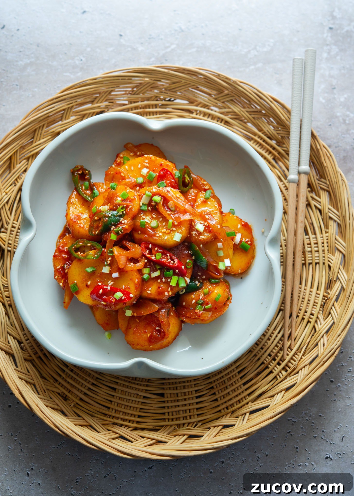 Spicy Korean Braised Potatoes (Maeun Gamja Jorim) 3 Korean spicy potato side dish in a serving dish.