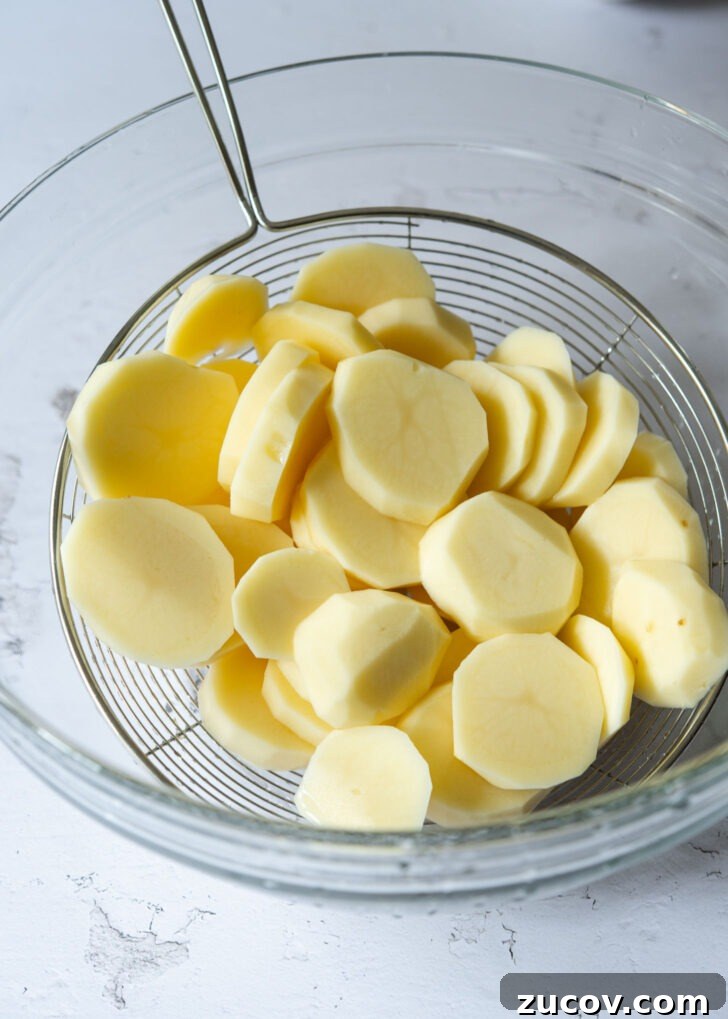 Spicy Korean Braised Potatoes (Maeun Gamja Jorim) 5 Potato slices drained through strainer.
