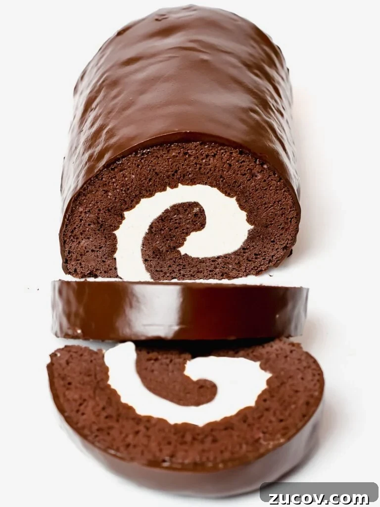 5-Minute Chocolate Ganache Recipe for Cakes, Glazes & Dips 10 chocolate roll cake, swiss roll cake filled with cream and covered in a chocolate ganache glaze
