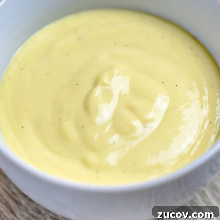 5-Minute Chocolate Ganache Recipe for Cakes, Glazes & Dips 13 vanilla sauce bread pudding sauce in a bowl