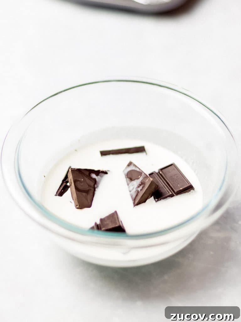 5-Minute Chocolate Ganache Recipe for Cakes, Glazes & Dips 3 chocolate and heavy cream in a glass bowl
