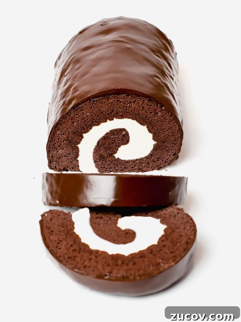 5-Minute Chocolate Ganache Recipe for Cakes, Glazes & Dips 7 chocolate roll cake, known as swiss roll, filled with cream and covered with a chocolate ganache glaze