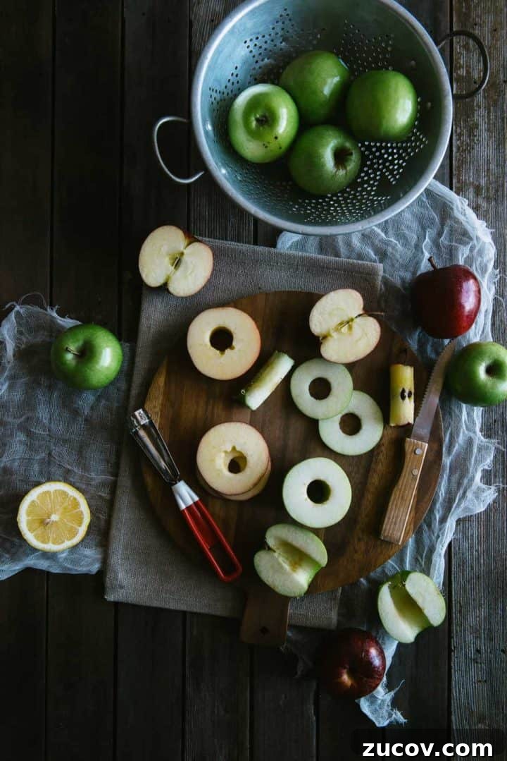 cut, raw apple rings being prepared to be made into fritters