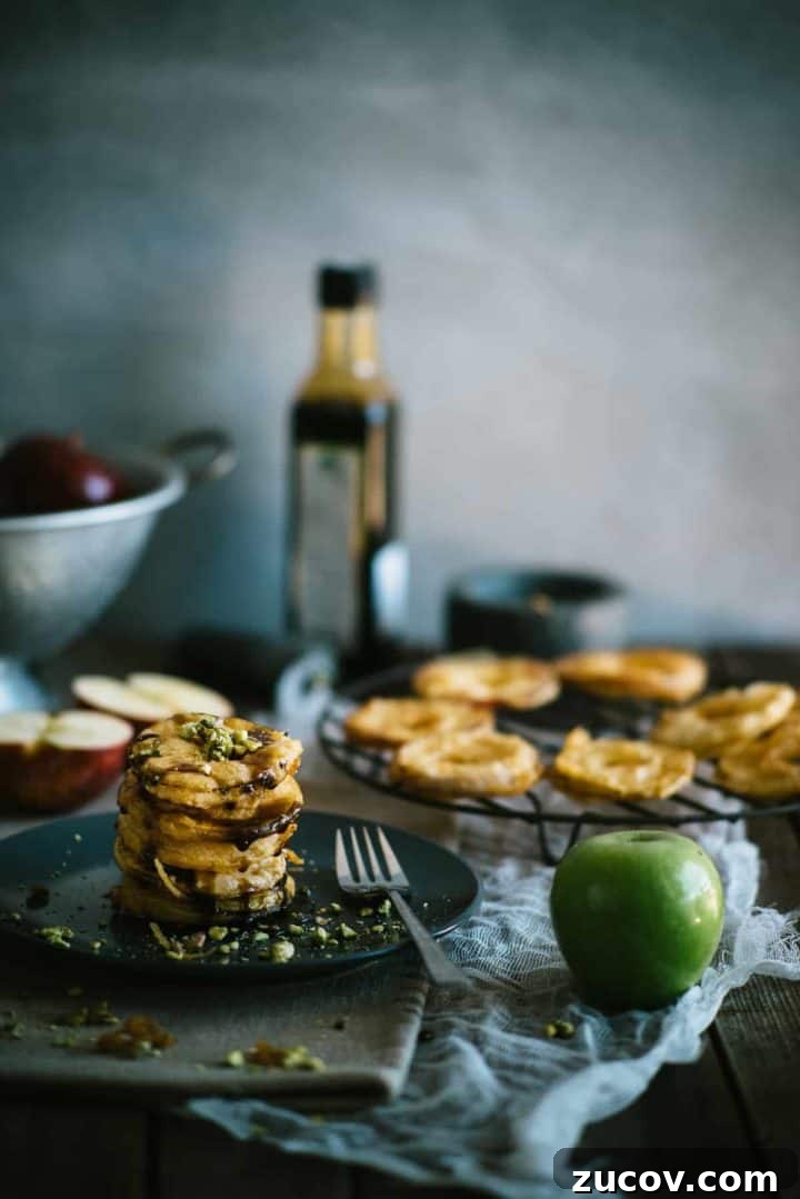 a stack of deep fried apple slices