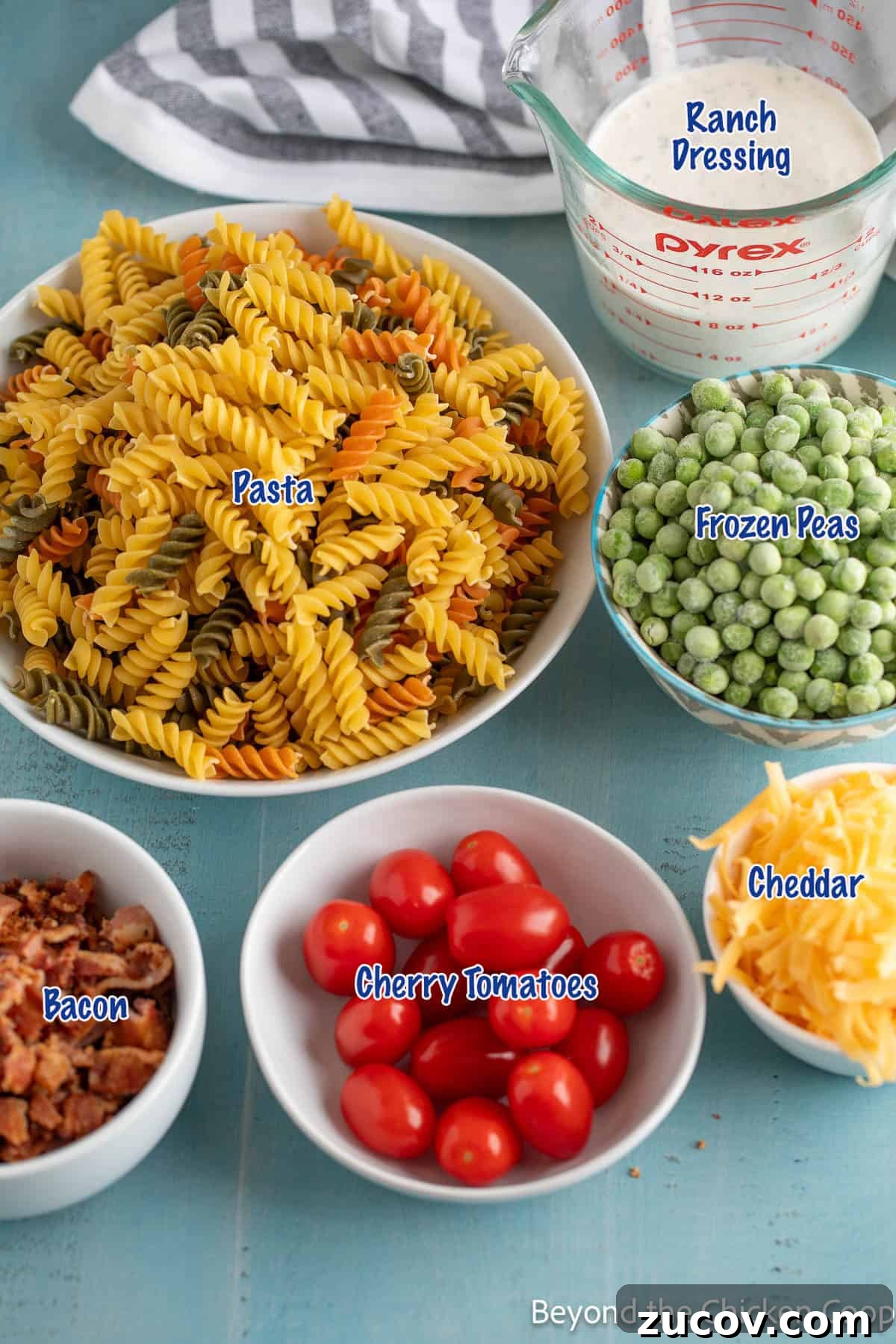 Creamy Bacon Ranch Pasta Salad with Crispy Bacon Crumbles 3 Pasta salad ingredients in small bowls.