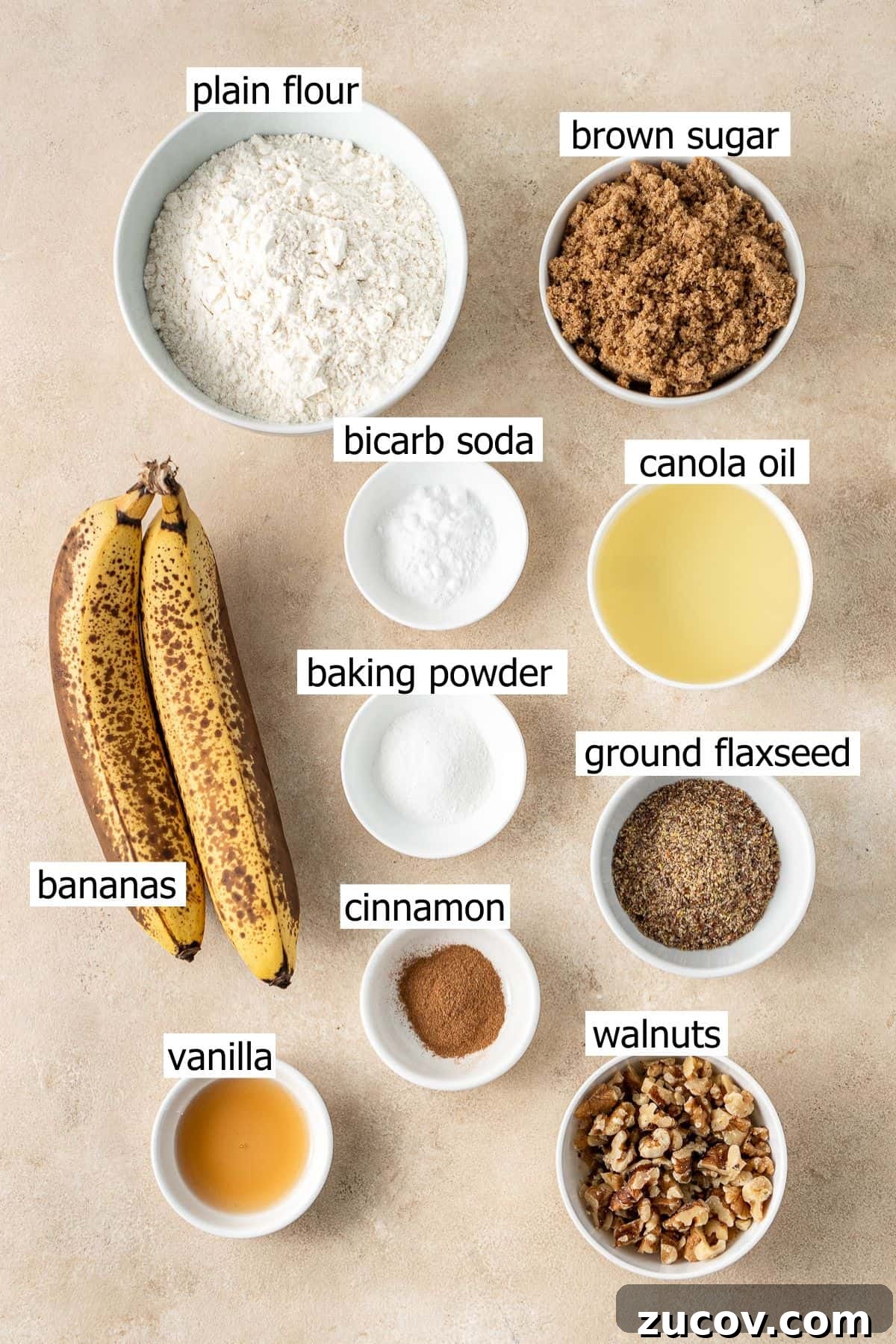 Ultimate Vegan Banana Bread Recipe You’ll Love 3 All ingredients needed to make vegan banana bread laid out in small bowls.