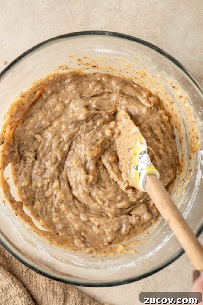 Ultimate Vegan Banana Bread Recipe You’ll Love 9 Mixing together the thick banana bread batter.