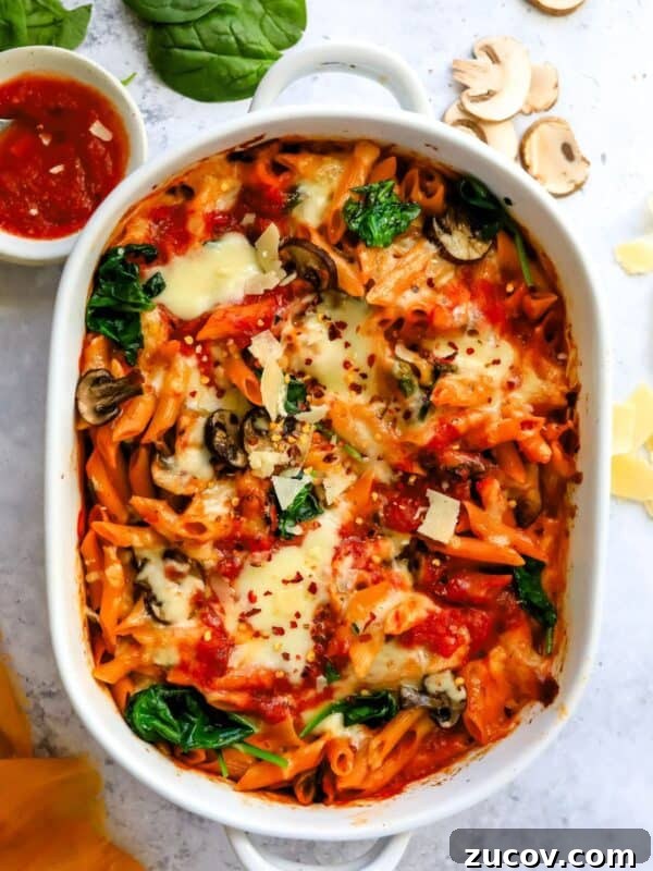 Roasted Red Pepper Pesto Recipe for Pasta, Sandwiches & Dips 10 Baked Penne Pasta up close in a baking dish.