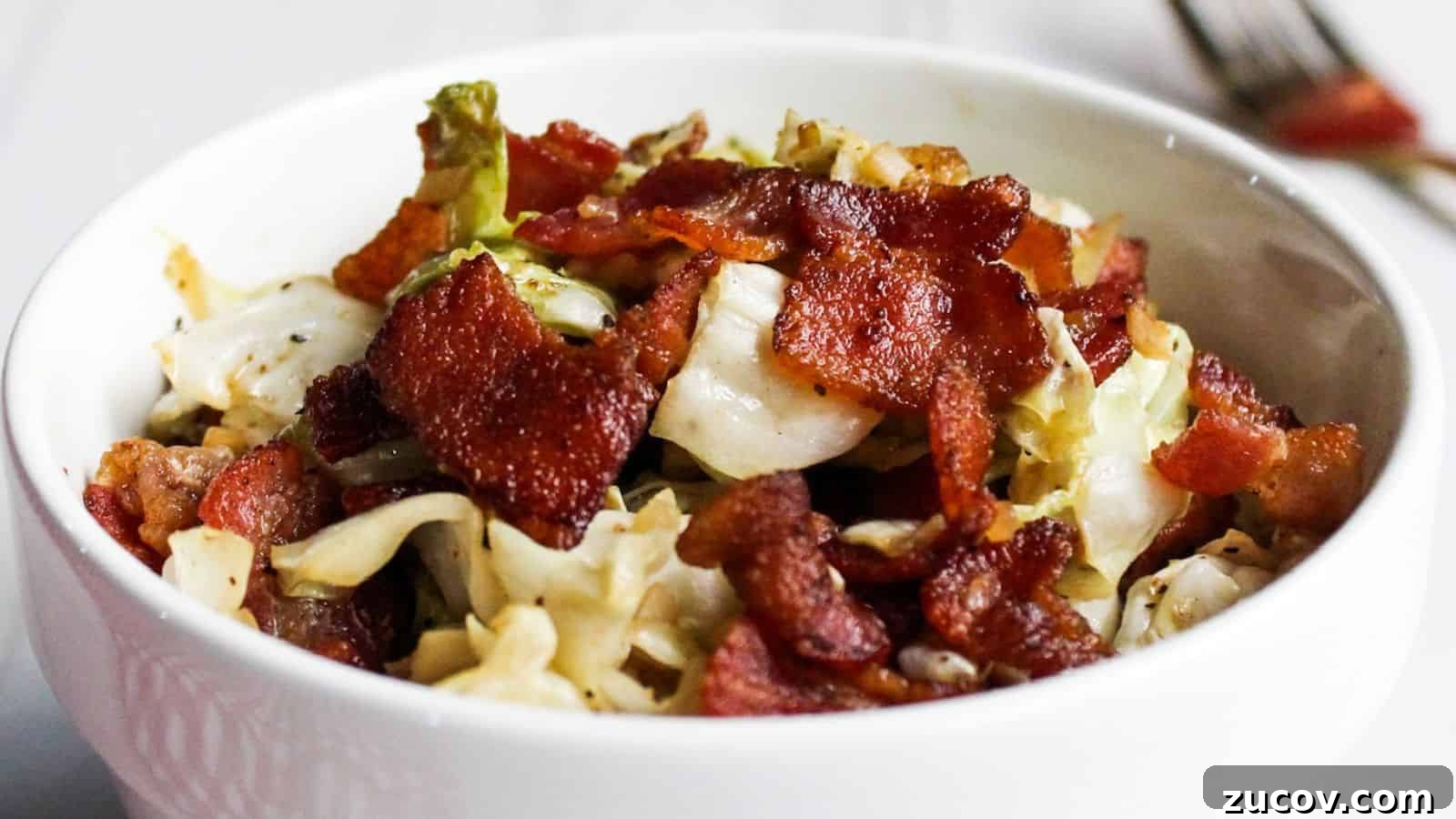 17 Comforting Side Dishes That Steal the Show 18 Cabbage and bacon in white serving bowl.