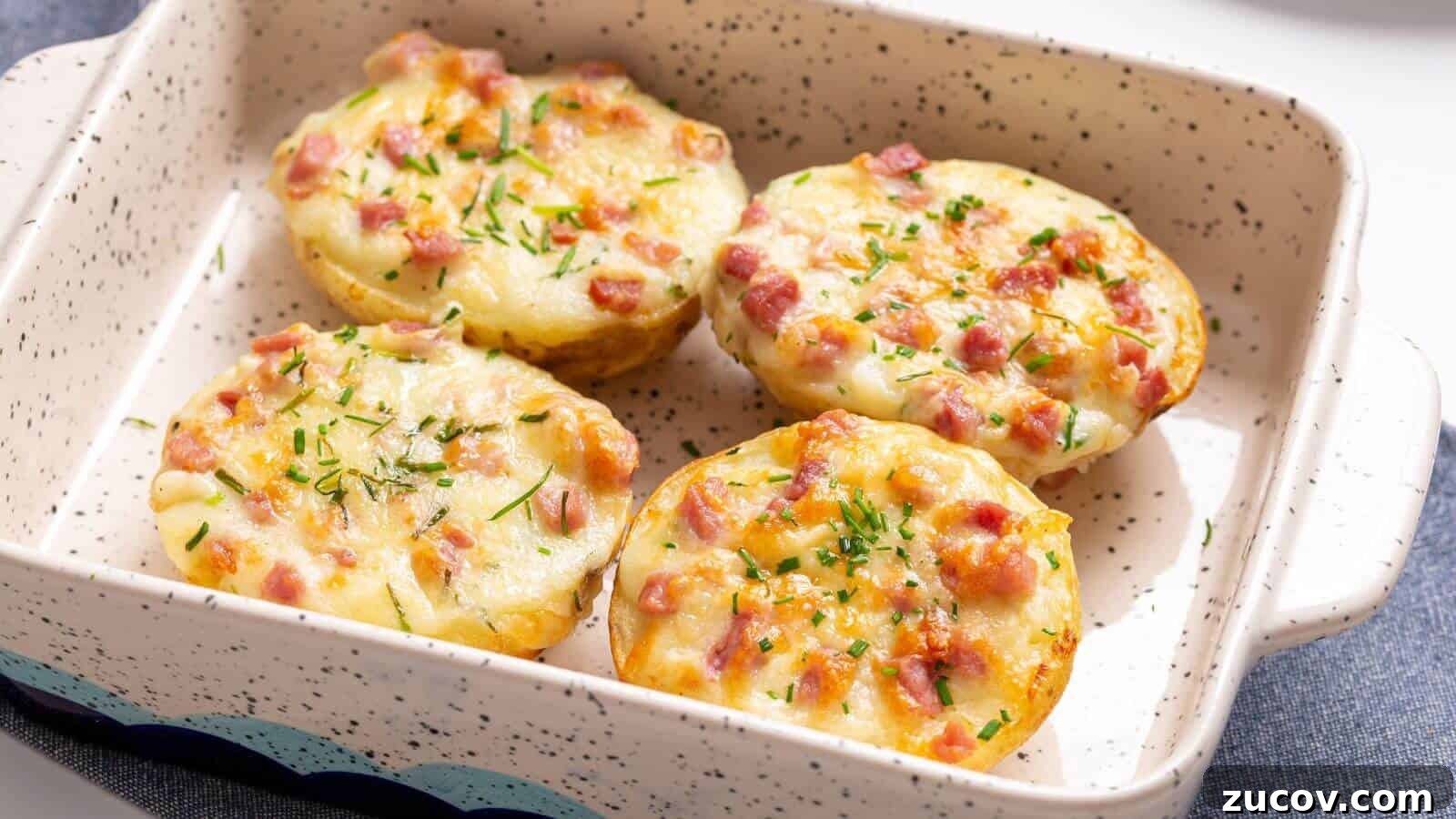 17 Comforting Side Dishes That Steal the Show 10 Four twice baked potatoes in a small baking dish.