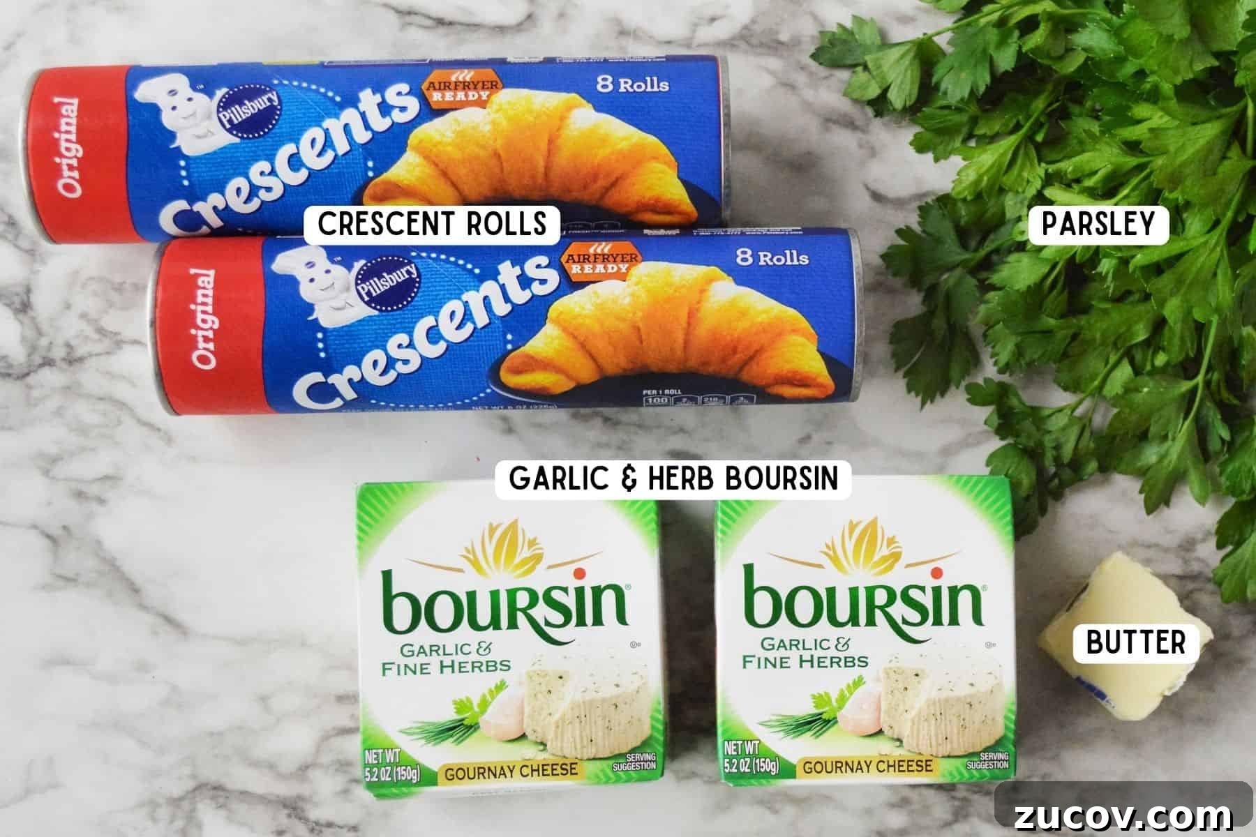Ingredients for Crescent Rolls Tree: 2 cans of Pillsbury crescent rolls, fresh parsley, pat of butter, and two pacakges of Boursin garlic and herb cheese.