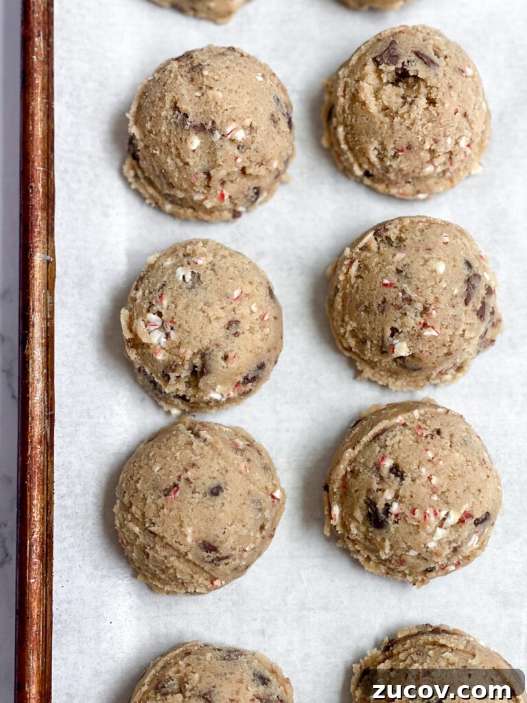 Peppermint Chocolate Chip Cookie Recipe with Crispy Edges 8 cookie dough balls shaped.