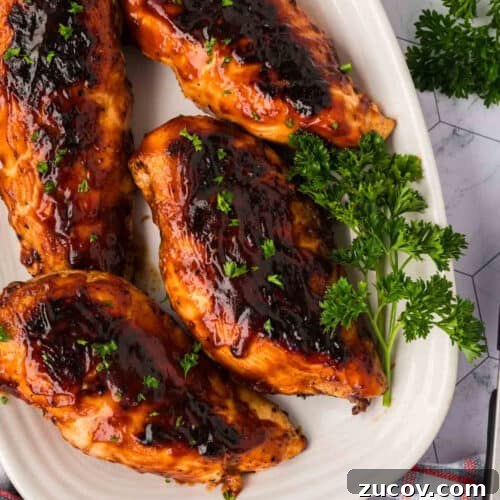 February Blackstone Chicken Recipes: What to Grill This Month 6 BBQ Chicken Breast on a white platter