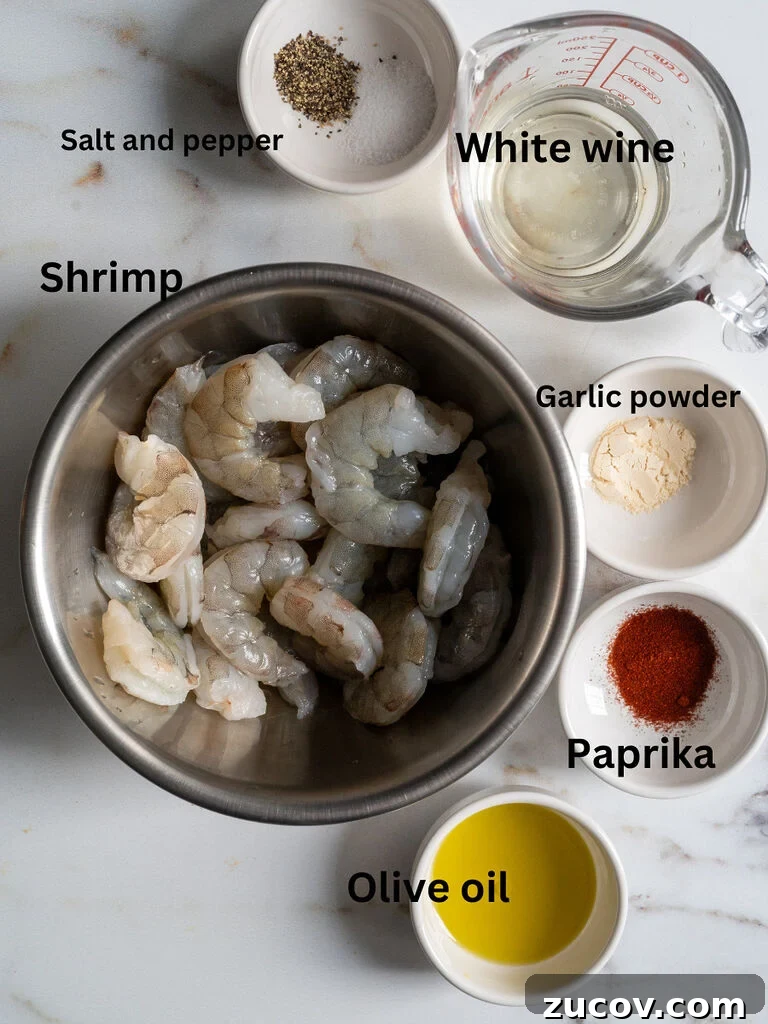 Garides Youvetsi: Greek Shrimp with Orzo Recipe 4 Ingredients for the shrimp: shrimp, salt and pepper, white wine, garlic powder, paprika and olive oil.