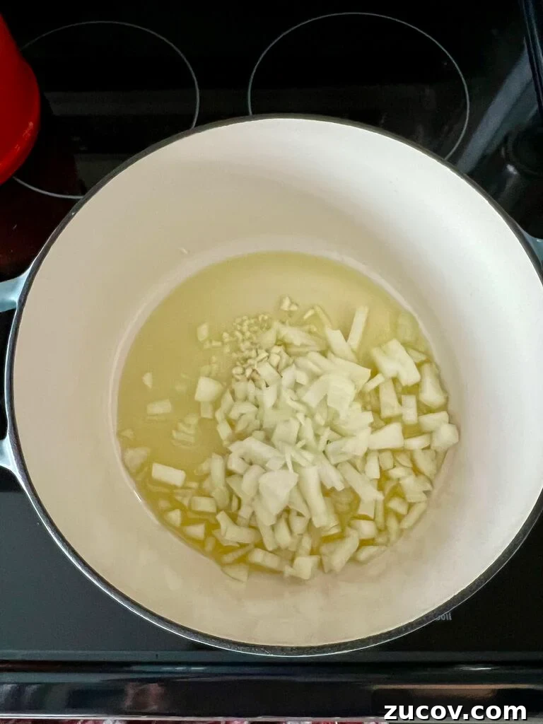 Garides Youvetsi: Greek Shrimp with Orzo Recipe 5 frying onions.