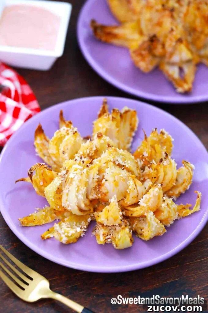 Crispy Blooming Onion Recipe Made in the Air Fryer 7 air fryer blooming onion on a plate