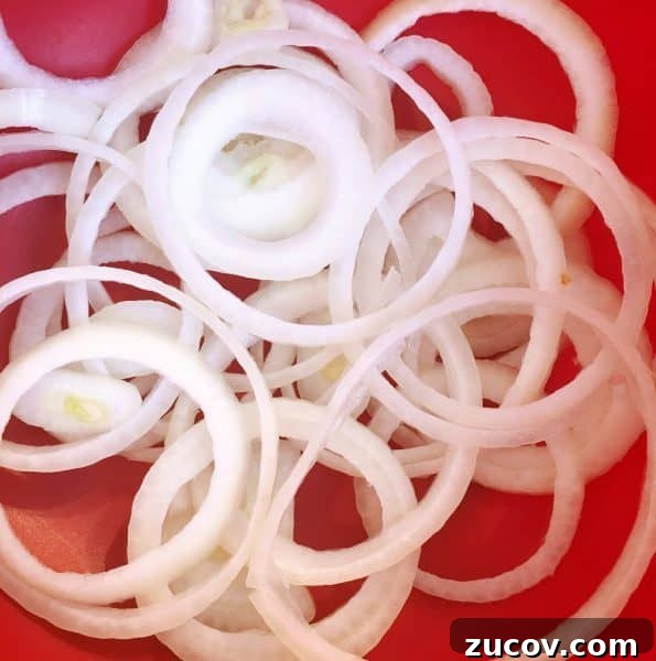 Seattle-Style Hot Dogs: Where to Find the City's Iconic Bite 4 Thinly slice yellow onion