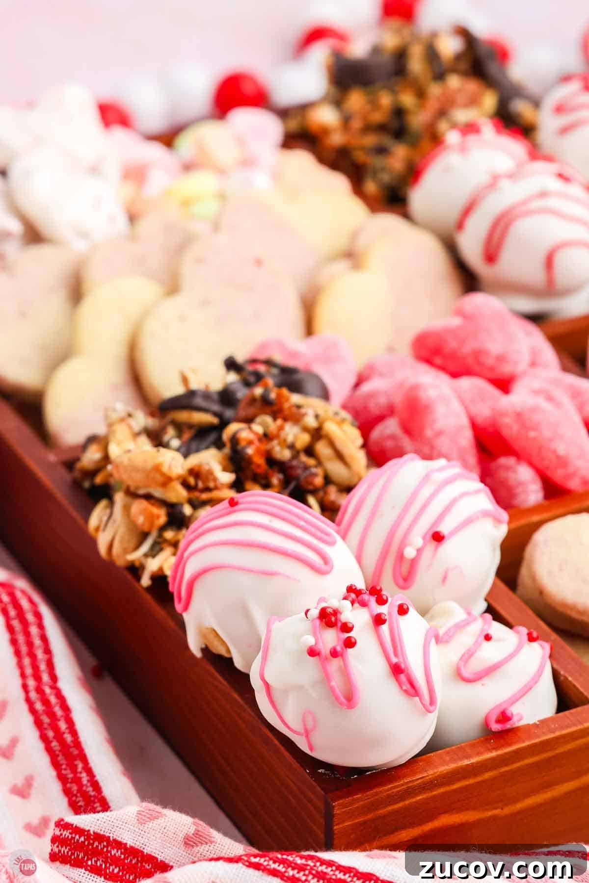 Valentine's Day Treat Box Ideas for Gifts and Party Favors 5 pink, red, and white truffles in a box
