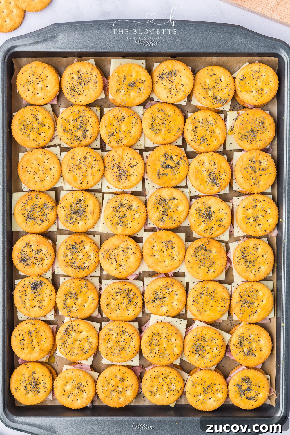 Ritz Cracker Sandwich Recipes: Savory & Sweet Party Bites 10 Brush the tops of the sandwiches with the melted butter mixture and then sprinkle a pinch of poppy seeds over each sandwich.