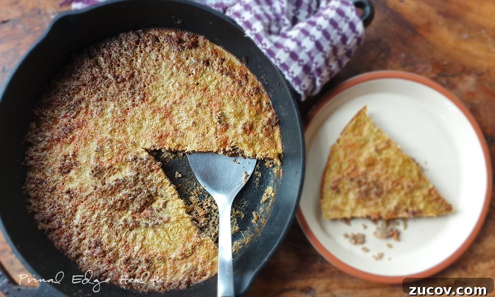 28 Low-Histamine Recipes for Histamine Intolerance-Friendly Meals 15 Organ meat pie in a pan with a sliced placed on a plate.
