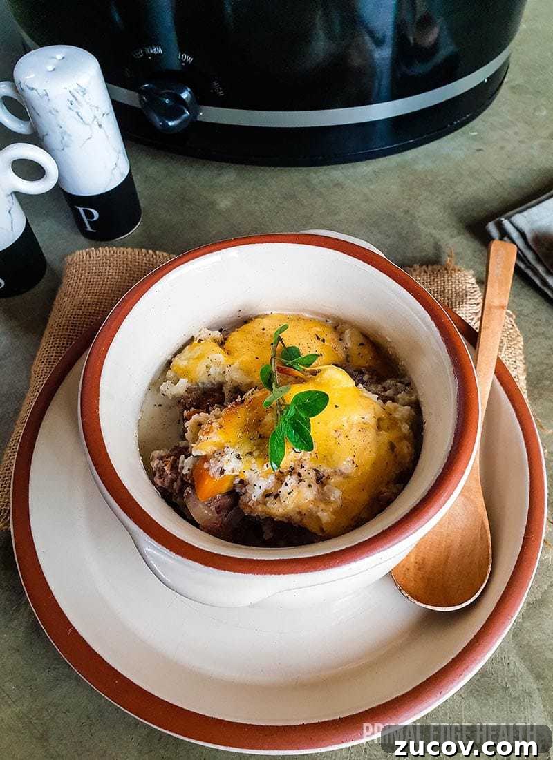 28 Low-Histamine Recipes for Histamine Intolerance-Friendly Meals 21 A bowl of keto shepherd's pie on a grey surface.