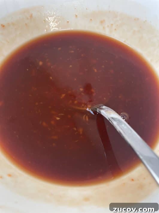 Crispy Chilli Beef Recipe: Crunchy, Spicy Takeout-Style Django 6 Sauce ingredients mixed