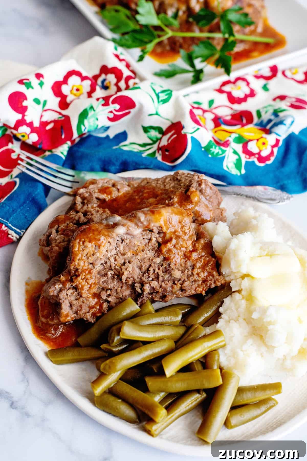 Classic Slow Cooker Meatloaf Recipe for Tender, Juicy Results 11 serve with green beans and mashed potatoes