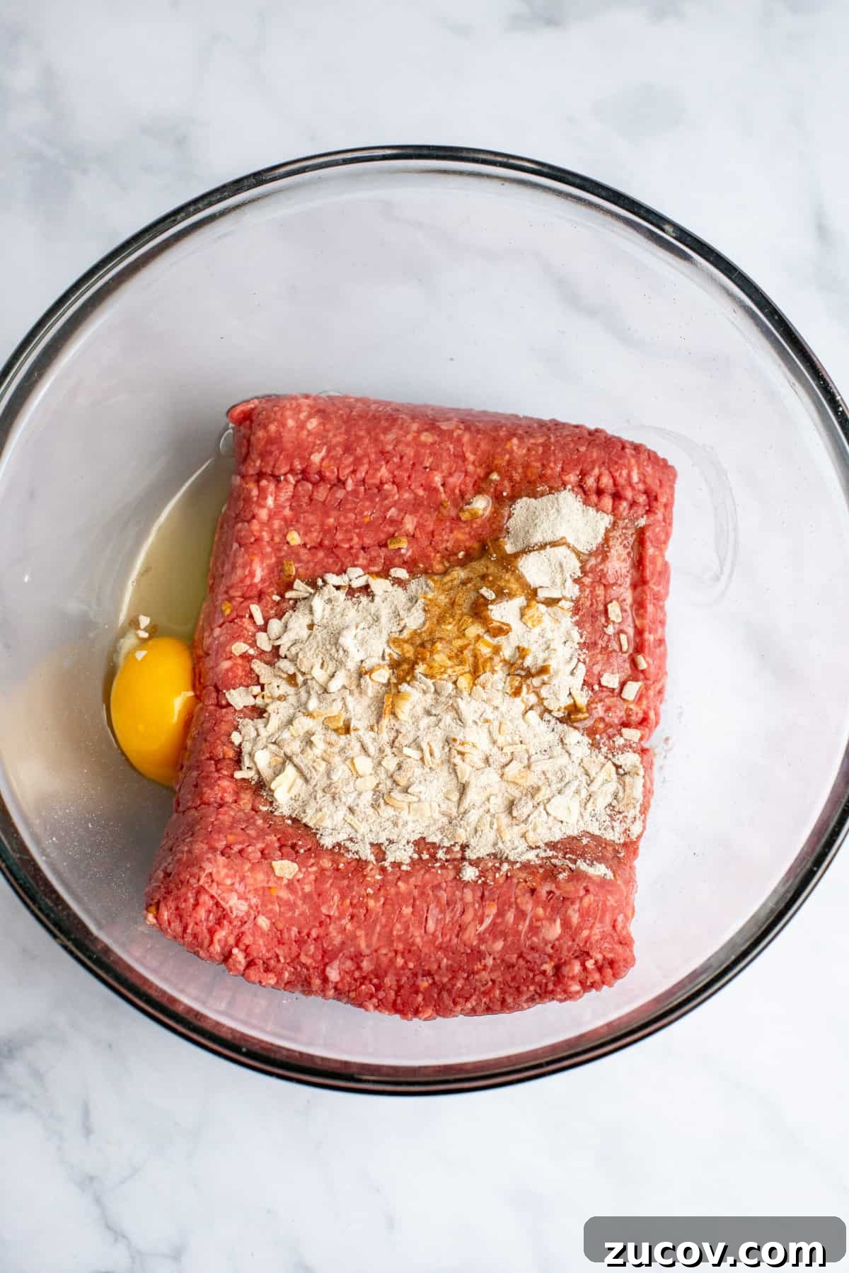 Classic Slow Cooker Meatloaf Recipe for Tender, Juicy Results 4 place meat, egg, and onion soup mix into a large bowl