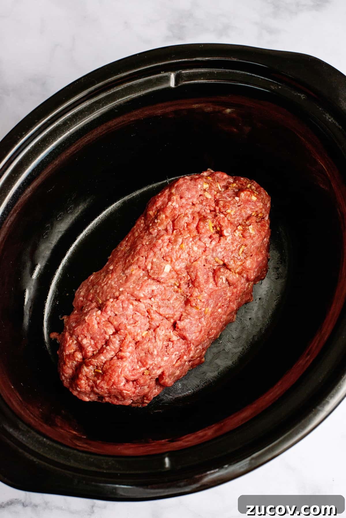 Classic Slow Cooker Meatloaf Recipe for Tender, Juicy Results 6 shape slow cooker meatloaf into a loaf