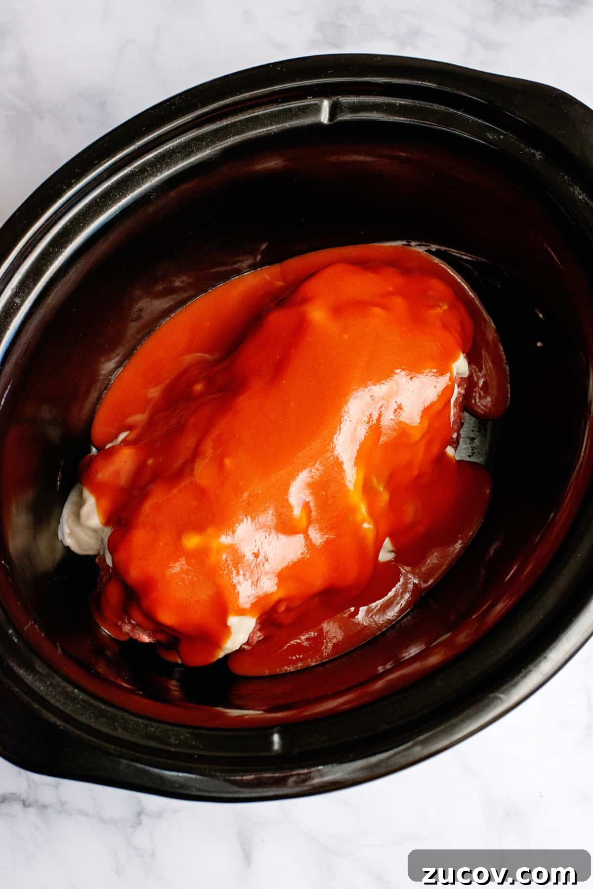 Classic Slow Cooker Meatloaf Recipe for Tender, Juicy Results 8 pour tomato soup on the loaf